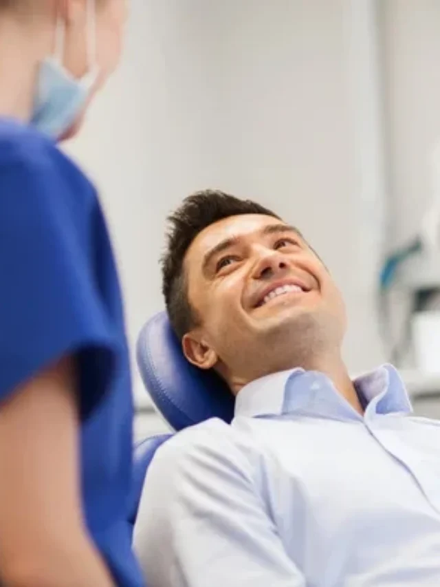 depositphotos_94915388-stock-photo-female-dentist-with-happy-male