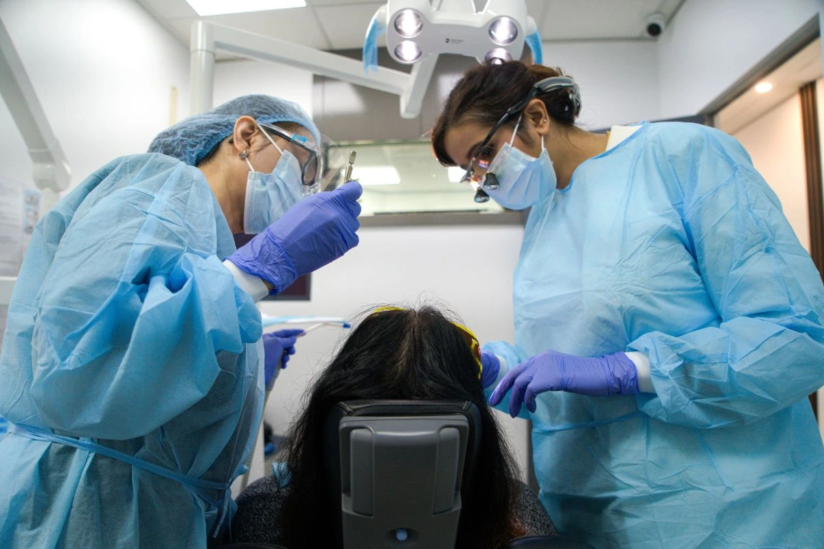 Our dentist providing expert care for healthy smiles and quality dental treatments