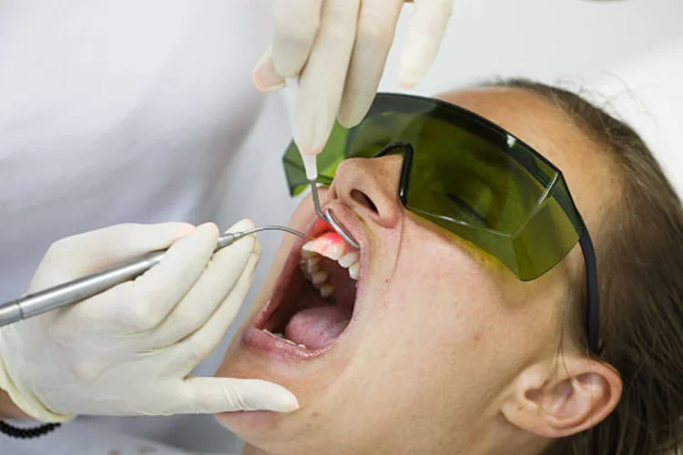 Enhance Your Dental Experience with Advanced Laser Treatments 3 Patient receiving advanced laser dental treatment